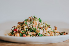 Buckwheat salad with parsley, roasted celery, mushrooms, nutritional yeast and cashew-pepper sauce